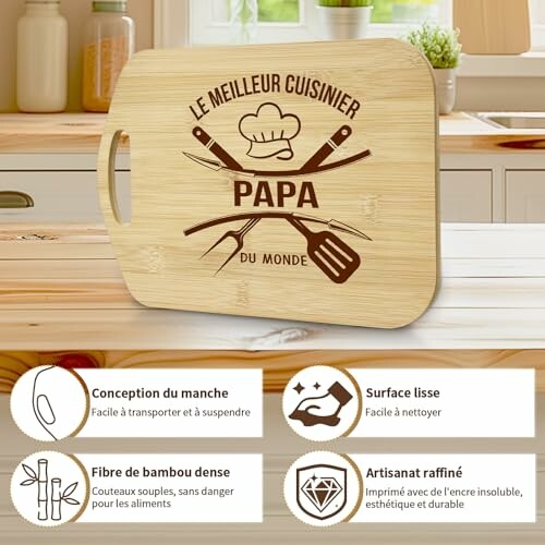 Planche à découper en bambou avec texte 'Le meilleur cuisinier papa du monde'.